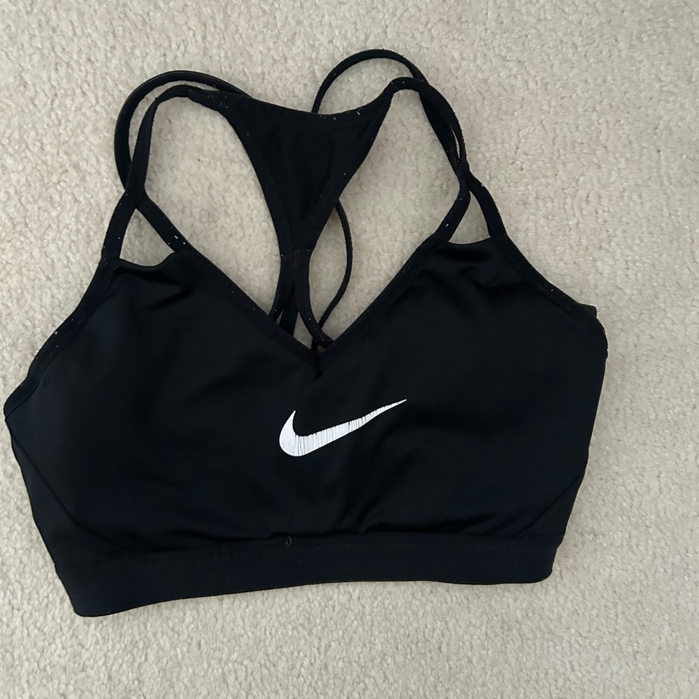 Nike black supportive strappy sports bra with removable padding